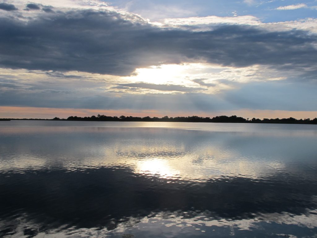 A peaceful evening view of a lake