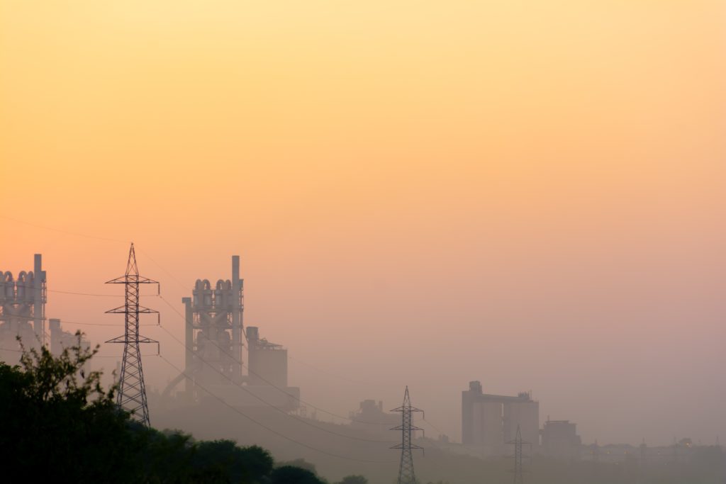 An industrial skyline obscured by pollution