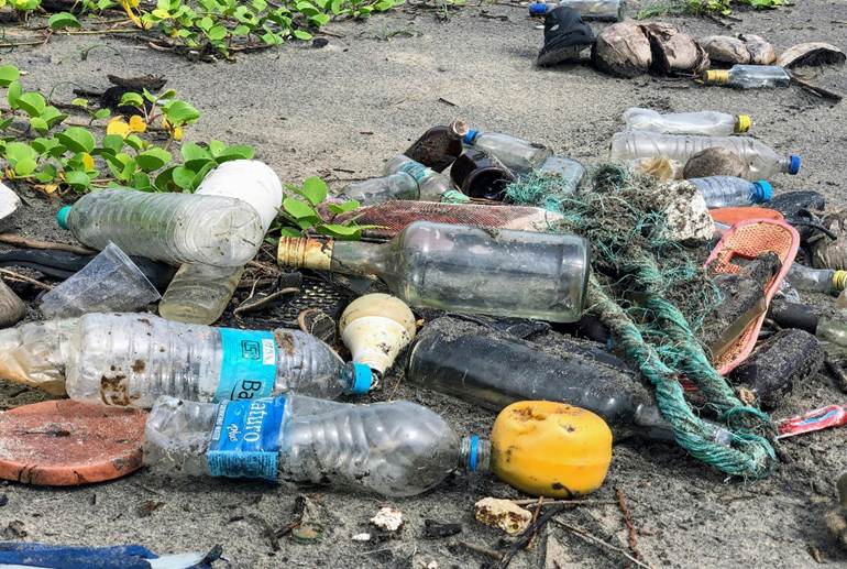Dirty plastic bottes and other ocean rubbish